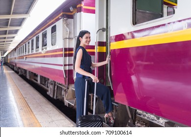 Asian Women Wear Dress Suit Travel By Transport Train Station Classic Background ,  Startup Business Concept ,25-35 Year Old 