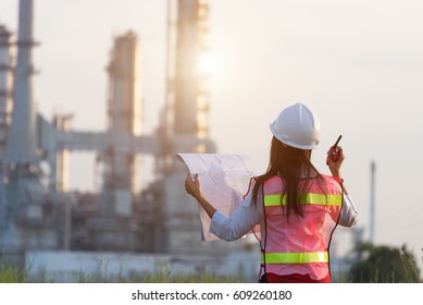 Asian Women Work  Experience And Professional Occupational Engineer Electrician With Safety Control At Power Plant Energy Industry And Construction , Thailand.  Engineer Concept
