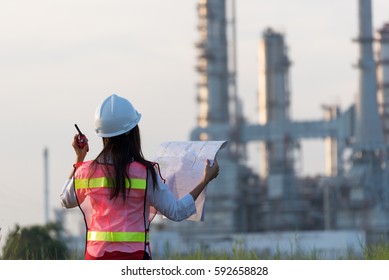 Asian Women Worker And Engineer Woman Electrician Work Safety Control At Power Plant Energy Industry , Thailand.  Engineer Business Concept
