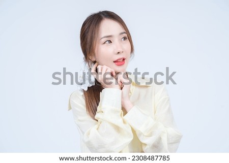 Asian women's casual outfits and natural makeup are recommended for promotion, White background. 