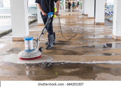 Asian Worker Cleaning Sand Wash Exterior Walkway Using Polishing Machine And Chemical Or Acid