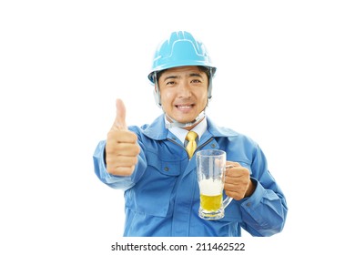 Asian Worker Drinking Beer 