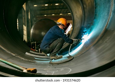 Asian Worker Wearing Hard Hat Hard Working In Factory Workshop