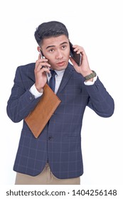 Asian young attractive handsome busy business man with smart phone, wear suit, isolated on white background