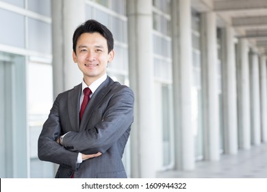 Asian Young Business Man Working