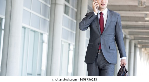 Asian young business man working