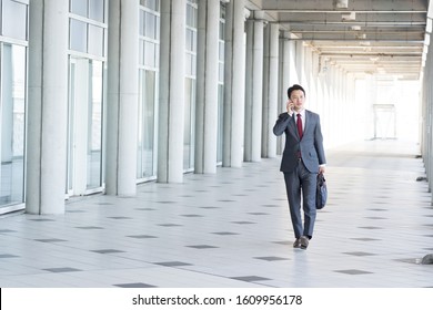 Asian Young Business Man Working