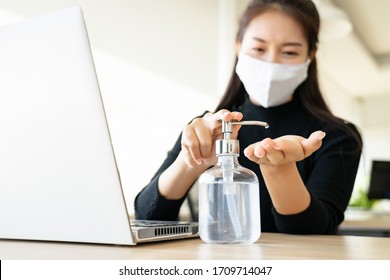 Asian Young Business Woman Hand Washing By Alcohol Gel In Co-working Space Work Place, Protection Policy For Stop Break Out Corona Virus Or Covid 19 Spread