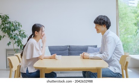 Asian young couple at home