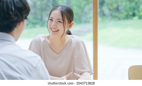 Asian young couple at home