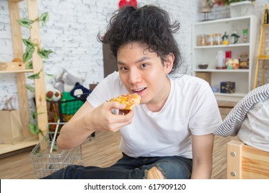 Asian Young Handsome Man Are Eating Delicious Pizza, He Love Pizza, Eat Concept 