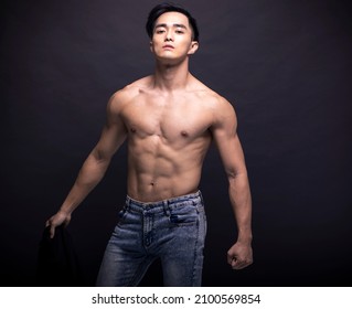 Asian Young Man With Fitness Body