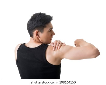 Asian Young Man Having Shoulder Pain, Closeup Portrait On White.