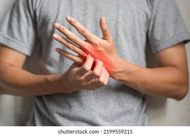 Asian Young Man Scratching His Hand. Concept Of Itchy Skin Diseases Such As Scabies, Fungal Infection, Eczema, Psoriasis, Rash, Allergy, Etc.