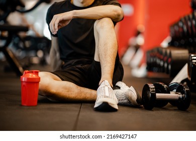 Asian Young Man Sitting Rest After Workout For Good Healthy In Fitness, Lifestyle And Sport Exercise Concept.