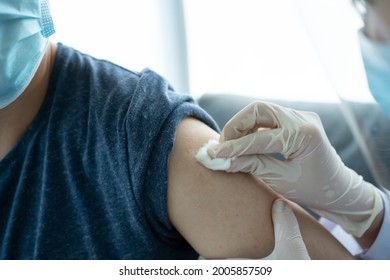 Asian Young Man Very Scare A Vaccination Shot, Man Having A Needle Phobia Problem And Feared While Shooting A Vaccine.