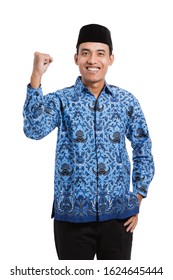 Asian Young Man Wearing Batik Korpri With Spirited Hand Gesture, Government Officials Of Indonesia