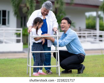 Asian young man and woman caring for an elderly woman in a nursing home, son and granddaughter tease middle eastern grandmother with walking aid, nursing caer. - Powered by Shutterstock