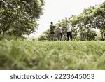 Asian young man and woman stretch body to warm up. Concept for healthy lifestyle and oudoor life.