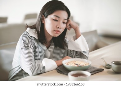 Asian Young Woman Eating Food