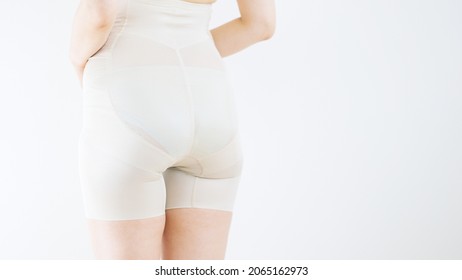 Asian Young Woman In Girdle