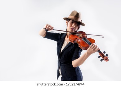 Asian Young Woman Musician Playing The Classical Music Violin On White Background In Studio.