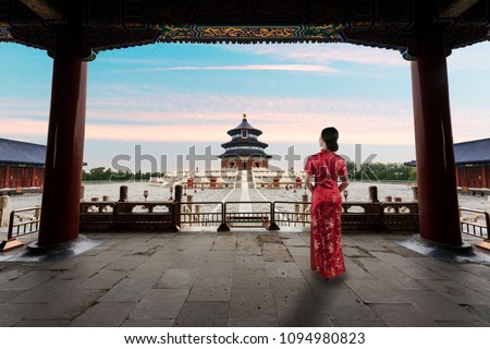 Asian young woman in old traditional Chinese dresses in the Temple of Heaven in Beijing, China. Landscape and culture travel, or historical building and sightseeing concept 商業照片 © 