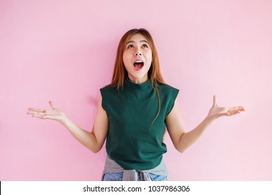 Asian Young Woman In Surprising Emotion, Face Look Up Above With Opened Mouth And Hands, Emotional Of Female Concept, Front View