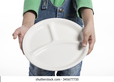 A Asian(korean, Japanese, Chinese) Girl(kid, Child, Woman, Female) Make A Pose To Hide Her Face With Smile And Hold A Ceramic White Empty Food Tray For Kids, Baby Isolated White.