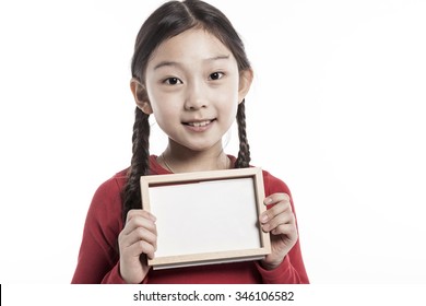 A Asian(korean, Japanese, Chinese) Girl(kid, Student, Child, Woman, Female) Wearing Red Shirts And Denim Pants Stand Up With A Wood Photo Frame For Friend And Family Isolated White.