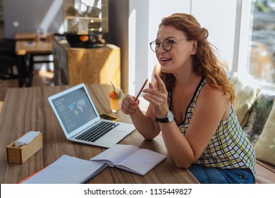 Asking Waiter. Remote Worker Wearing Glasses Feeling Really Thirsty While Asking Waiter For Some Water