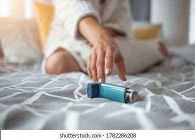 Asmathic Girl Catching Inhaler Having An Asthma Attack. Young Woman Having Asthma Attack. She Is Holding Inhaler. Asthmatic Woman Using An Asthma Inhaler During Asthma Attacks 