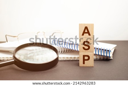 ASP sign on the wooden cubes on the blackground