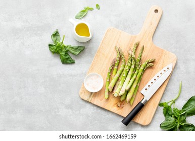 Asparagus Cooking Concept, Top Down View On A Cutting Board With Fresh Bunch Of Asparagus, Lying Down On A Kitchen Table, Spring Healthy Cooking Idea