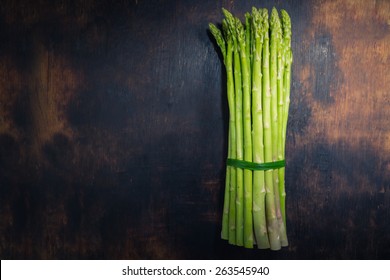 Asparagus on dark wood table - Powered by Shutterstock