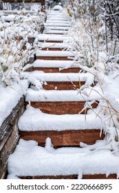 Aspen, Colorado Steps Landscaping Covered In Winter Weather Snow Terraced Along Wooden Stairs Architecture Of Garden Backyard Of House Or Home