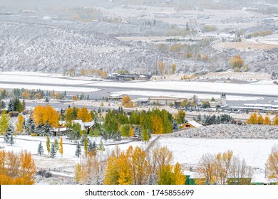 Aspen, Colorado Town City In Rocky Mountains Roaring Fork Valley High Angle View Of Airport During Autumn Season And Snow In October 2019