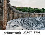 Aspendos or Belkıs is an ancient city famous for its ancient theater in the Serik district of Antalya province. Stock photo of Aspendos Ancient Theater