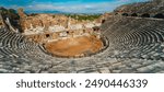 Aspendos, Antalya. Spectacular cloudscape accompanying the panoramic view of the Roman Theater in Turkey.