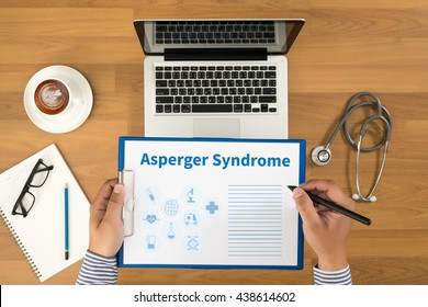 Asperger Syndrome Doctor Writing Medical Records On A Clipboard, Medical Equipment And Desktop On Background, Top View, Coffee