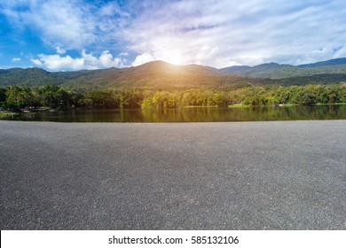 Asphalt Black Grey Road Landscape Lake Views At Ang Kaew Chiang Mai University In Nature Forest Mountain Views Spring Blue Sky Background With White Cloud.