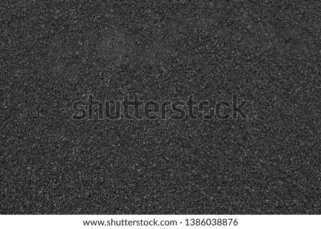 Asphalt close up texture. Raw asphalt texture