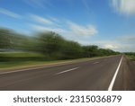 Asphalt country road without transport, motion blur effect