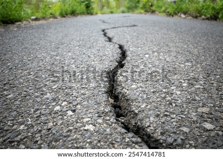 Similar – Cracks in asphalt Pothole