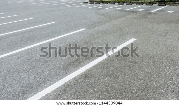Asphalt Floor,\
Empty parking lot at city center, Vacant Parking Lot, Parking lane\
painting on floor, copy\
space