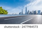 Asphalt highway road and city skyline with modern buildings scenery in Guangzhou. Car background.