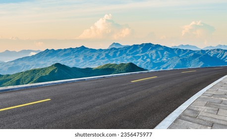 Asphalt highway road and mountain natural scenery at sunrise. panoramic view. - Powered by Shutterstock