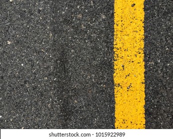 Yellow Paint Line On Black Asphalt Stock Photo 667699246 | Shutterstock