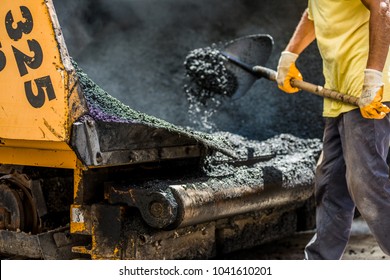 Asphalt Laying By Workers