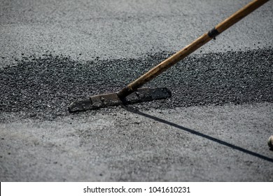 asphalt laying by workers